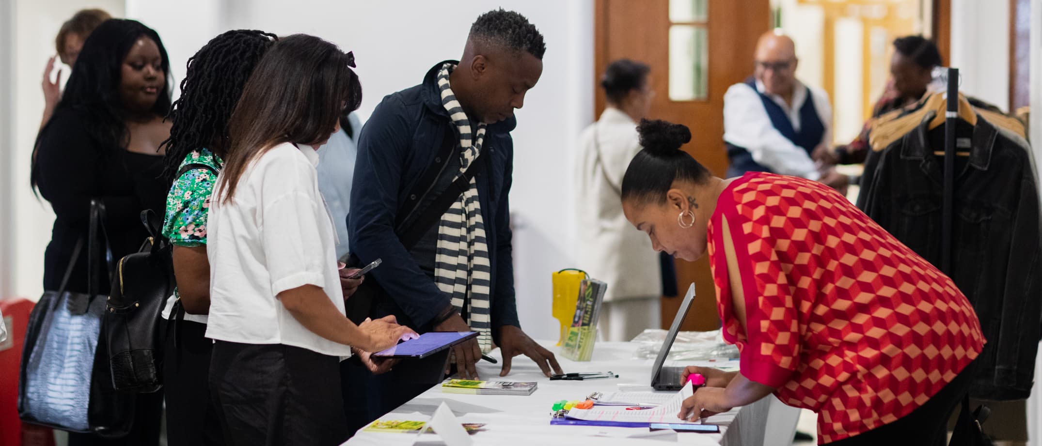 Attendees registering for the day's event at an APA conference